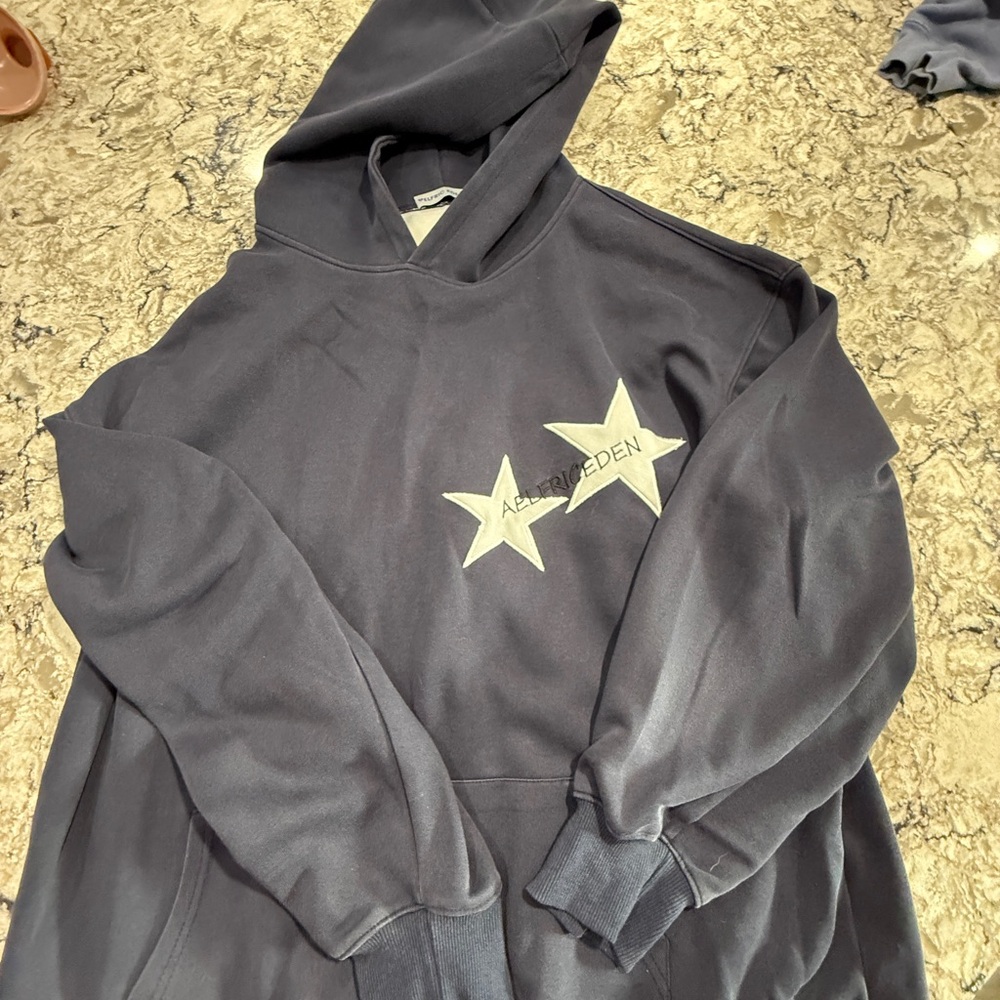 Aelfric Eden Black Hoodie with Star Accents